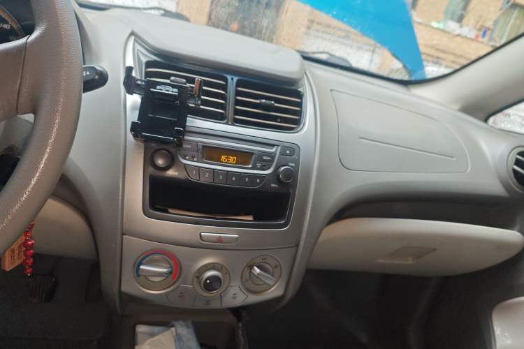 Used Chevrolet Sail 2013 Sedan 1.2L Manual Warm Edition Audio And AC Panel