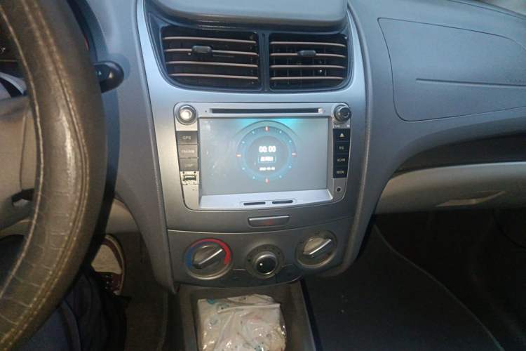Used Chevrolet Sail 2013 Sedan 1.4L Manual Ideal Edition Audio And AC Panel