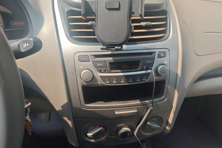 Used Chevrolet Sail 2013 Sedan 1.4L Manual Happiness Edition II Audio And AC Panel