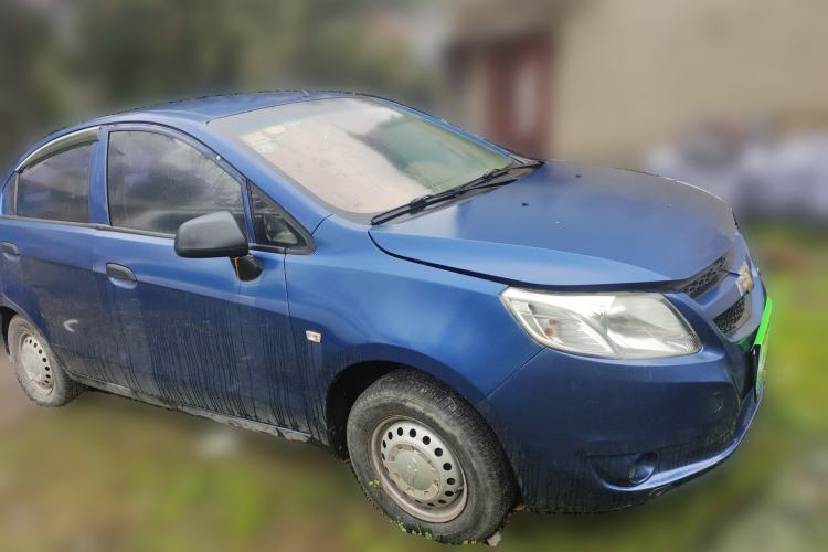 Used Chevrolet Sail 2013 Sedan 1.2L Manual Fashionable Happiness Edition Front Right 45 Deg