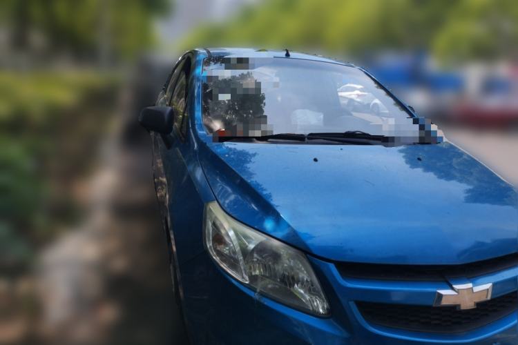 Used Chevrolet Sail 2013 Sedan 1.2L Manual Fashionable Happiness Edition Front Right 45 Deg