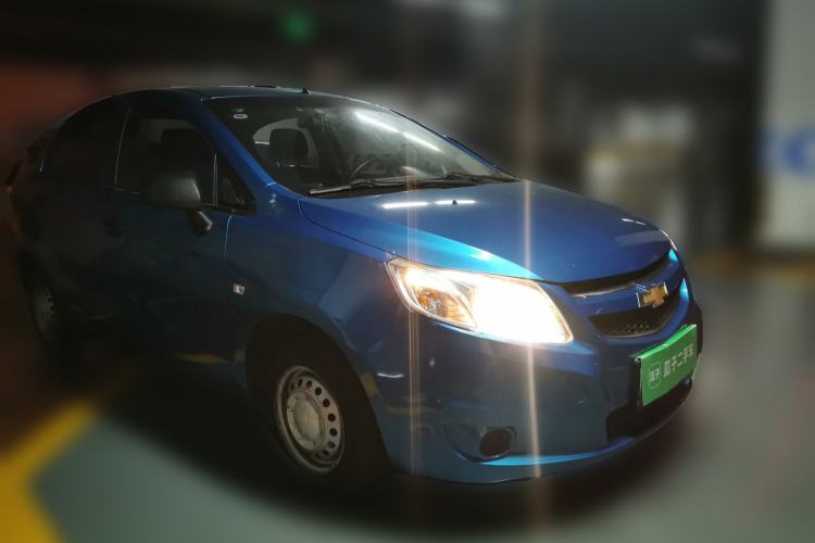 Used Chevrolet Sail 2013 Sedan 1.2L Manual Fashionable Happiness Edition Front Right 45 Deg
