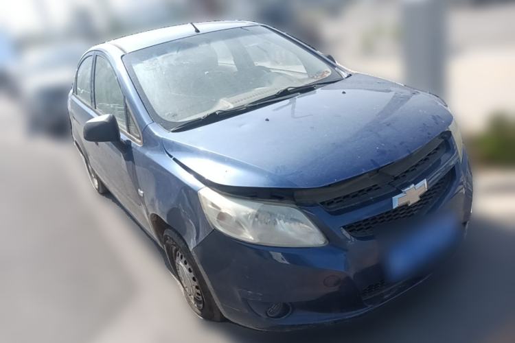 Used Chevrolet Sail 2013 Sedan 1.2L Manual Happiness Edition Front Right 45 Deg