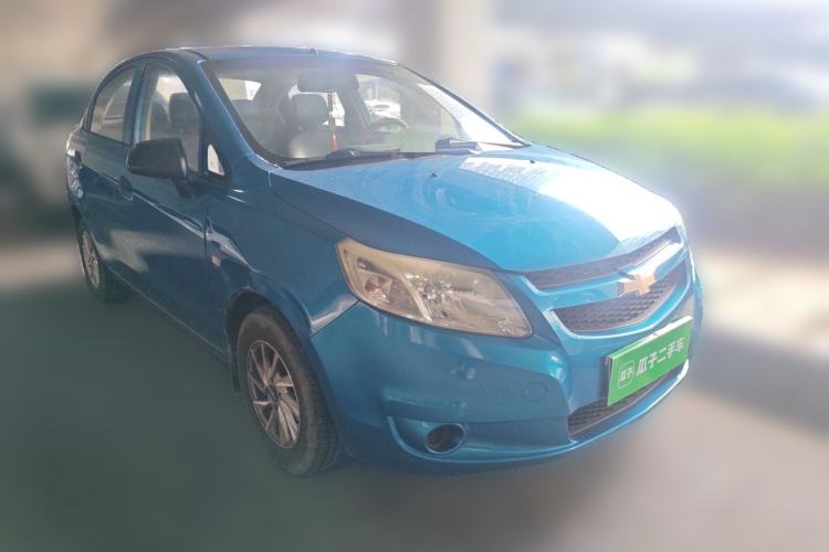 Used Chevrolet Sail 2013 Sedan 1.2L Manual Fashionable Happiness Edition Front Right 45 Deg
