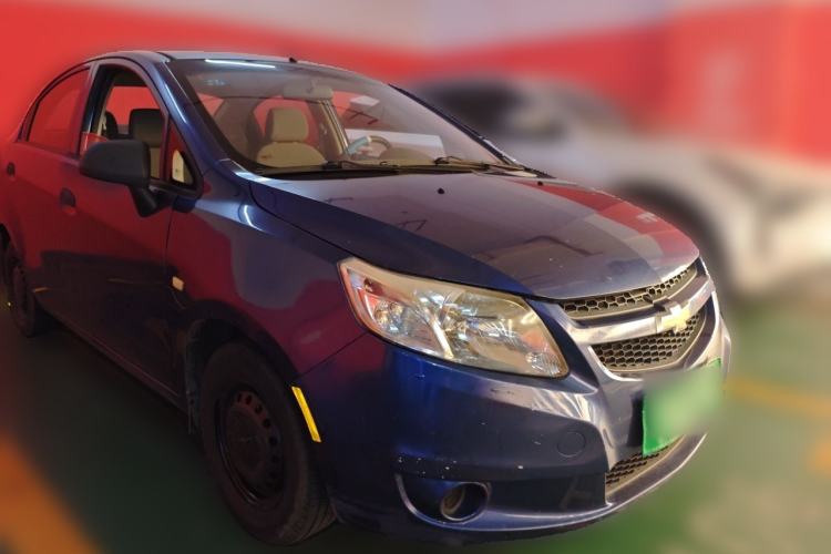 Used Chevrolet Sail 2013 Sedan 1.2L Manual Fashionable Happiness Edition Front Right 45 Deg