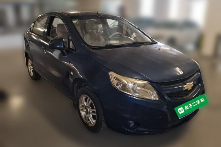 Used Chevrolet Sail 2013 Sedan 1.4L Manual Happiness Edition II Front Right 45 Deg