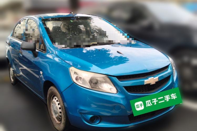 Used Chevrolet Sail 2013 Sedan 1.2L Manual Fashionable Happiness Edition Front Right 45 Deg