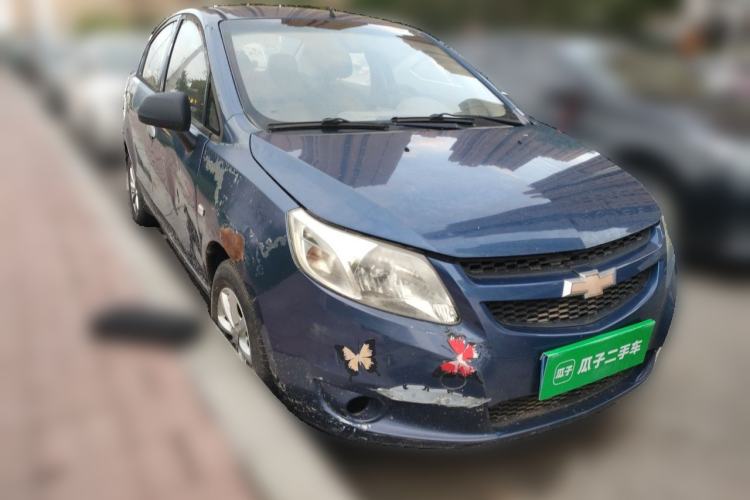 Used Chevrolet Sail 2013 Sedan 1.2L Manual Warm Edition Front Right 45 Deg
