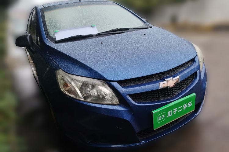 Used Chevrolet Sail 2013 Sedan 1.2L Manual Warm Edition Front Right 45 Deg