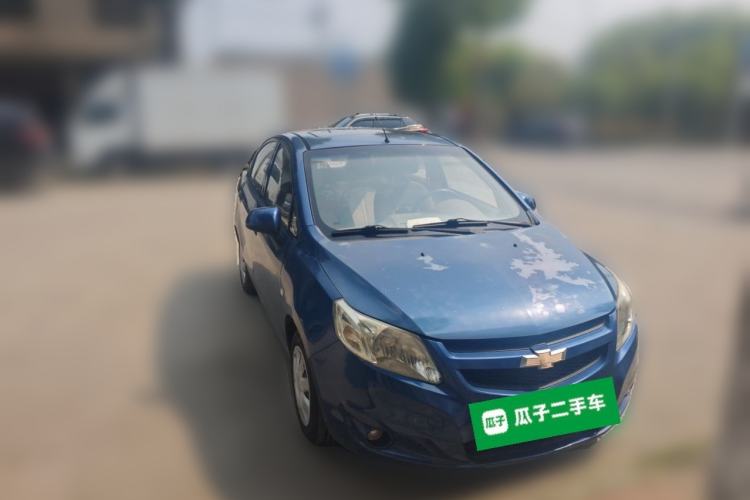 Used Chevrolet Sail 2013 Sedan 1.4L Manual Happiness Edition II Front Right 45 Deg