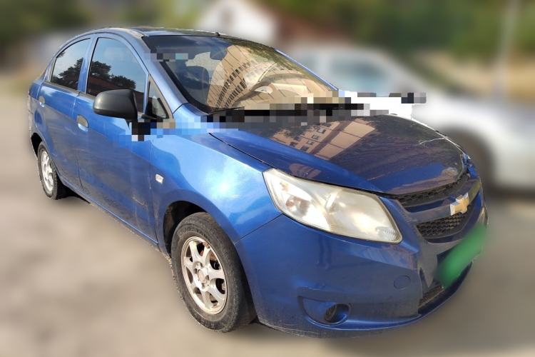 Used Chevrolet Sail 2013 Sedan 1.2L Manual Warm Edition Front Right 45 Deg