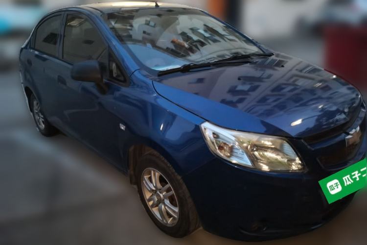 Used Chevrolet Sail 2013 Sedan 1.4L Manual Ideal Happiness Edition Front Right 45 Deg