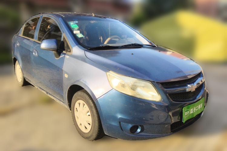 Used Chevrolet Sail 2013 Sedan 1.2L Manual Fashionable Happiness Edition Front Right 45 Deg