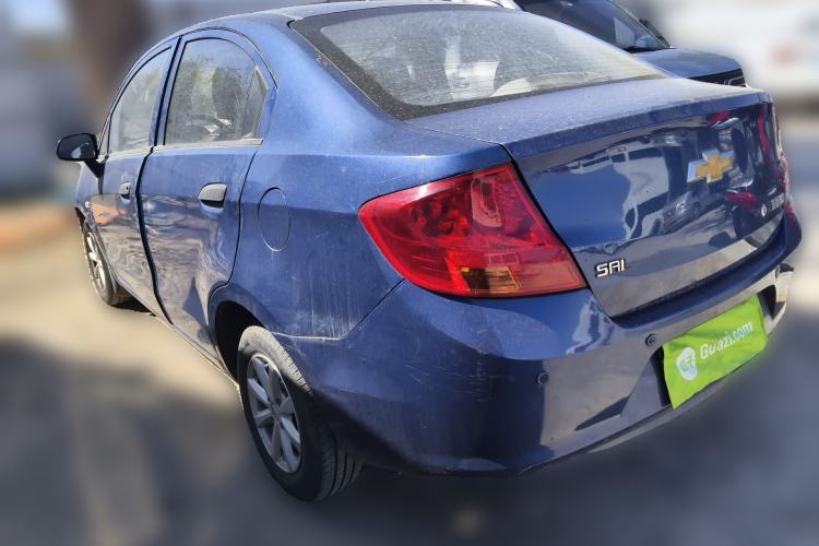 Used Chevrolet Sail 2013 Sedan 1.2L Manual Warm Edition Rear Left 45 Deg
