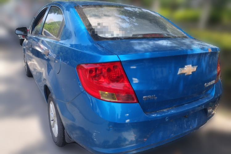 Used Chevrolet Sail 2013 Sedan 1.2L Manual Fashionable Happiness Edition Rear Left 45 Deg
