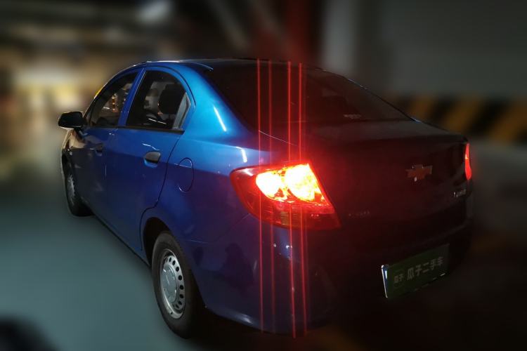 Used Chevrolet Sail 2013 Sedan 1.2L Manual Fashionable Happiness Edition Rear Left 45 Deg