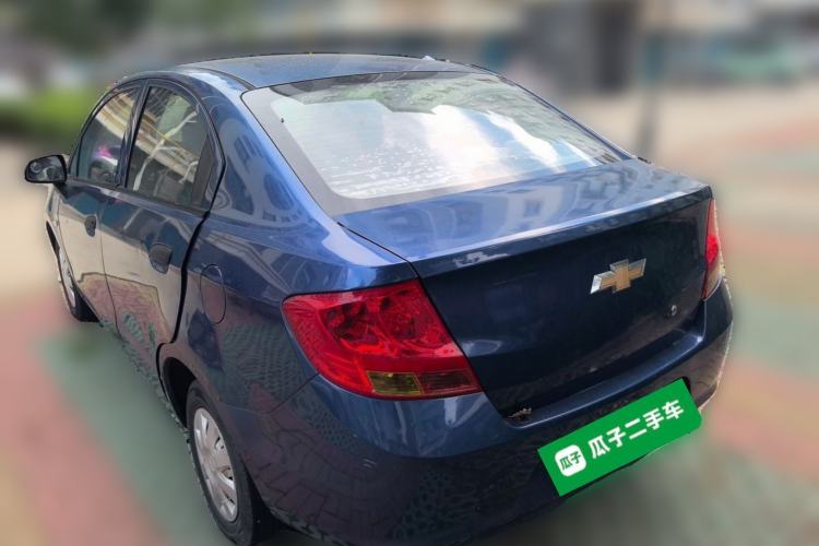 Used Chevrolet Sail 2013 Sedan 1.2L Manual Warm Edition Rear Left 45 Deg