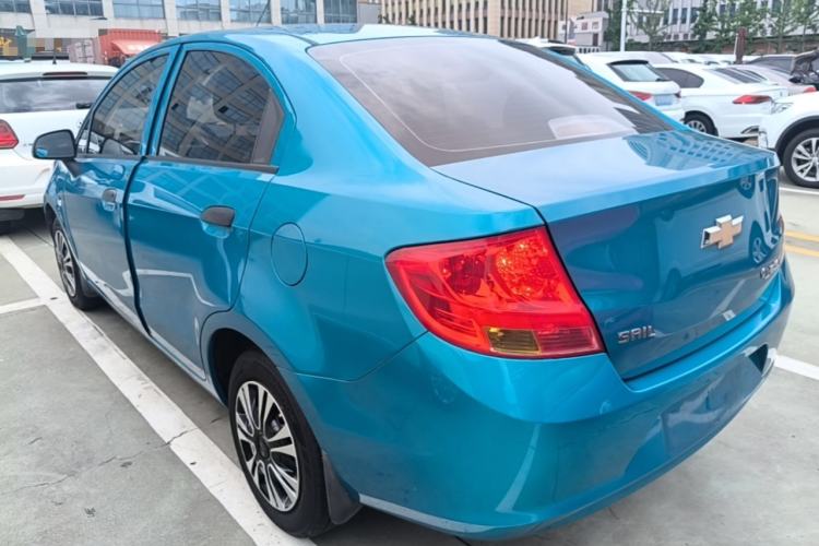 Used Chevrolet Sail 2013 Sedan 1.4L Manual Ideal Happiness Edition Rear Left 45 Deg