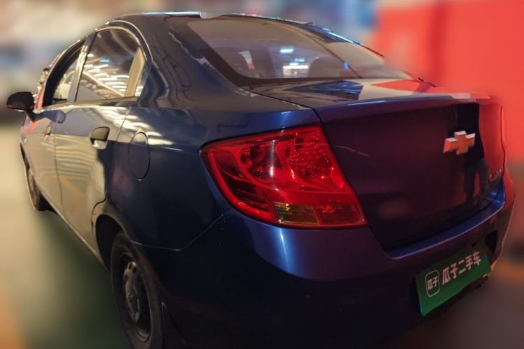 Used Chevrolet Sail 2013 Sedan 1.2L Manual Fashionable Happiness Edition Rear Left 45 Deg