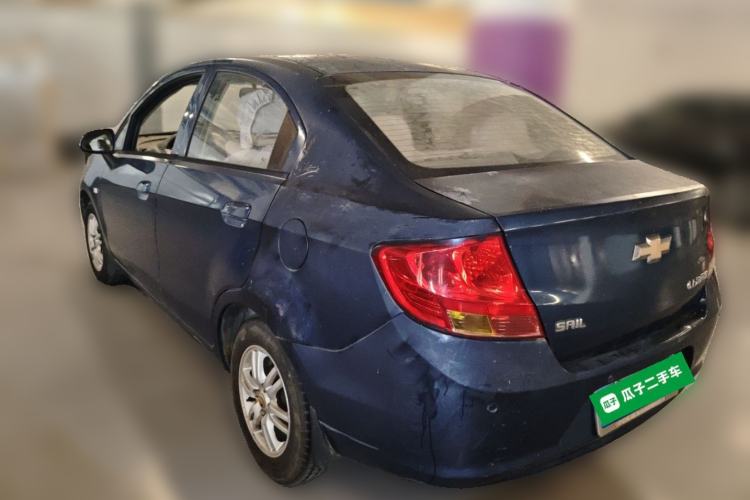 Used Chevrolet Sail 2013 Sedan 1.4L Manual Happiness Edition II Rear Left 45 Deg