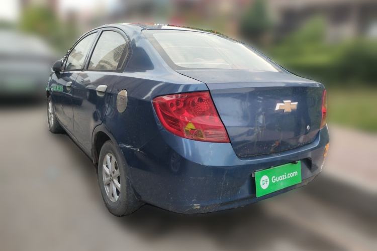 Used Chevrolet Sail 2013 Sedan 1.2L Manual Warm Edition Rear Left 45 Deg