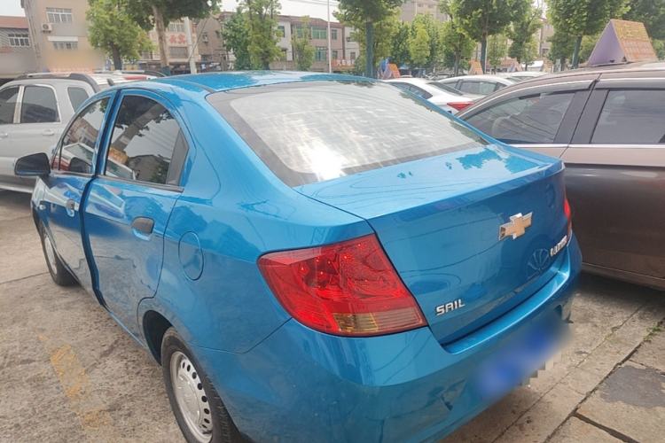 Used Chevrolet Sail 2013 Sedan 1.2L Manual Fashionable Happiness Edition Rear Left 45 Deg