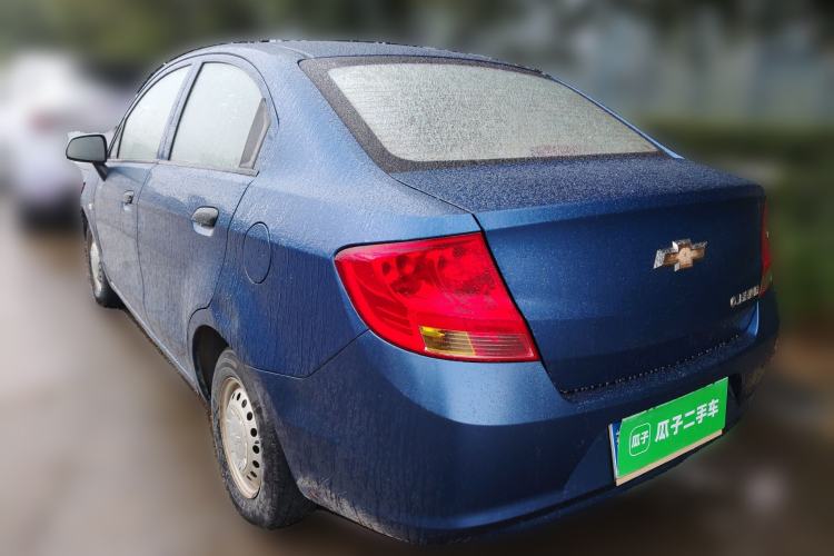 Used Chevrolet Sail 2013 Sedan 1.2L Manual Warm Edition Rear Left 45 Deg