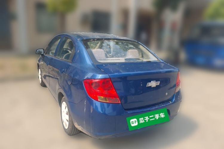 Used Chevrolet Sail 2013 Sedan 1.4L Manual Happiness Edition II Rear Left 45 Deg
