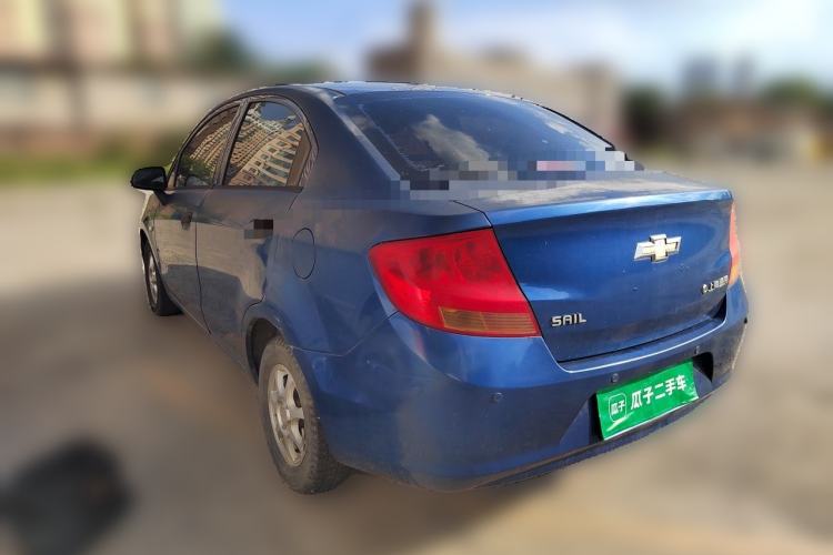 Used Chevrolet Sail 2013 Sedan 1.2L Manual Warm Edition Rear Left 45 Deg