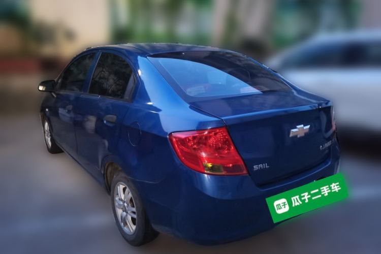 Used Chevrolet Sail 2013 Sedan 1.4L Manual Ideal Happiness Edition Rear Left 45 Deg