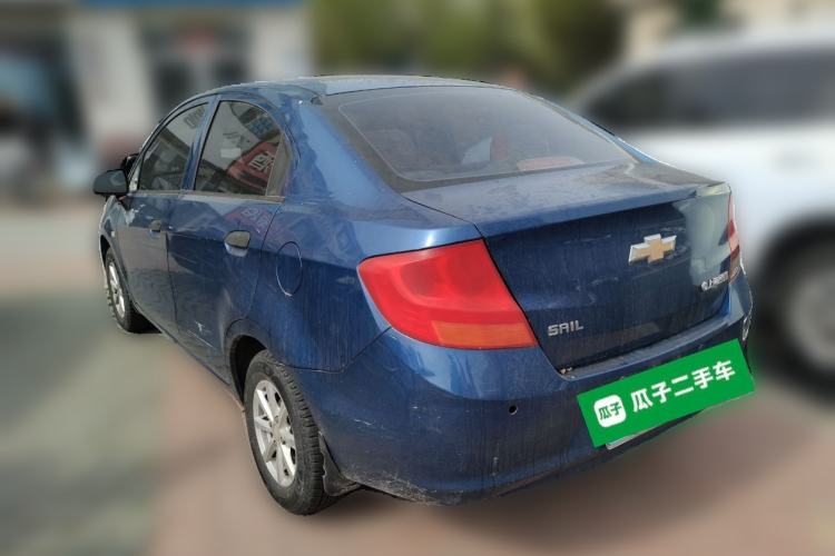 Used Chevrolet Sail 2013 Sedan 1.2L Manual Fashionable Happiness Edition Rear Left 45 Deg