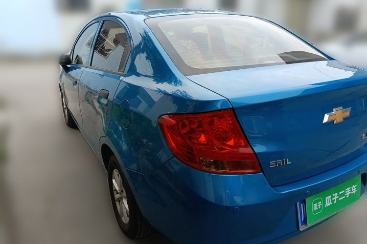 Used Chevrolet Sail 2013 Sedan 1.2L Manual Warm Edition Rear Left 45 Deg