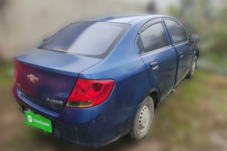 Used Chevrolet Sail 2013 Sedan 1.2L Manual Fashionable Happiness Edition Rear Right 45 Deg