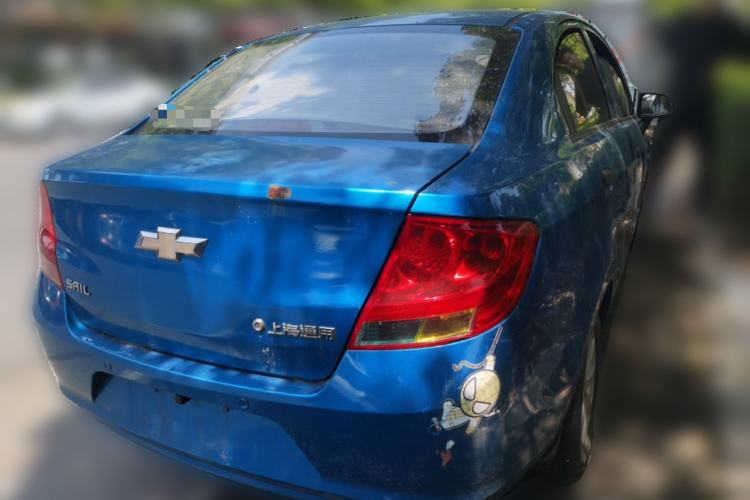 Used Chevrolet Sail 2013 Sedan 1.2L Manual Fashionable Happiness Edition Rear Right 45 Deg