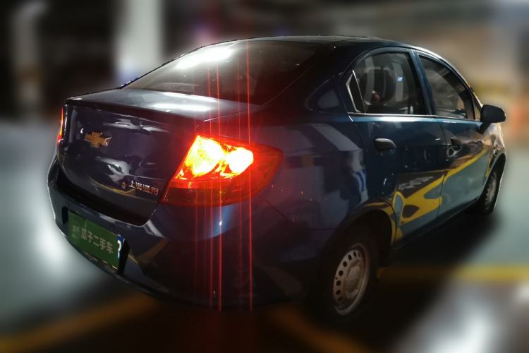 Used Chevrolet Sail 2013 Sedan 1.2L Manual Fashionable Happiness Edition Rear Right 45 Deg