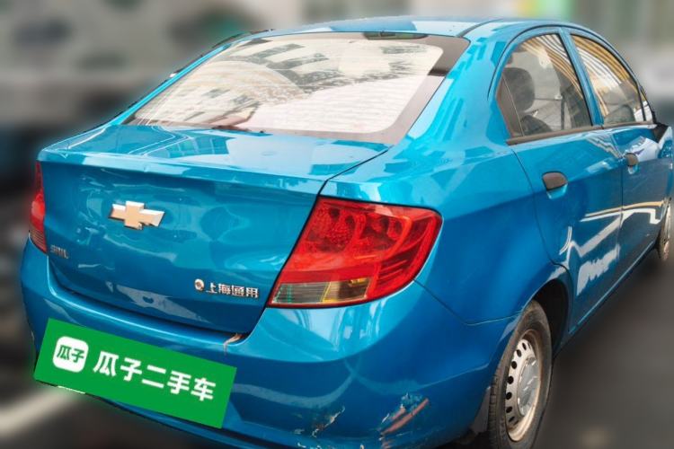Used Chevrolet Sail 2013 Sedan 1.2L Manual Fashionable Happiness Edition Rear Right 45 Deg