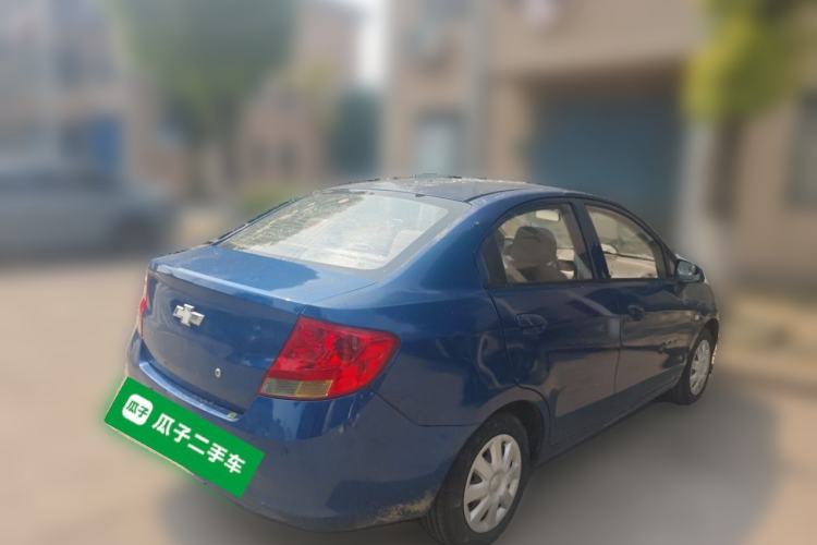 Used Chevrolet Sail 2013 Sedan 1.4L Manual Happiness Edition II Rear Right 45 Deg
