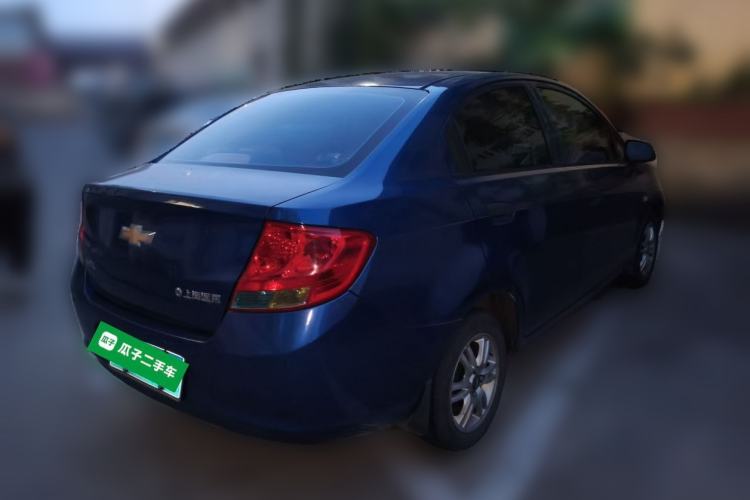 Used Chevrolet Sail 2013 Sedan 1.4L Manual Ideal Happiness Edition Rear Right 45 Deg