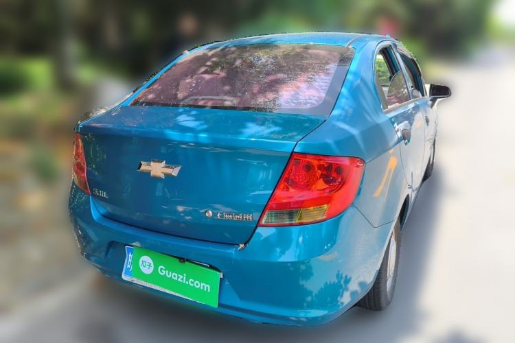 Used Chevrolet Sail 2013 Sedan 1.2L Manual Warm Edition Rear Right 45 Deg