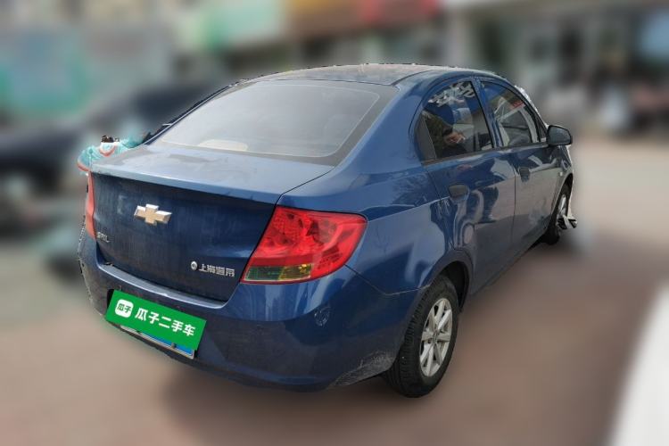 Used Chevrolet Sail 2013 Sedan 1.2L Manual Fashionable Happiness Edition Rear Right 45 Deg