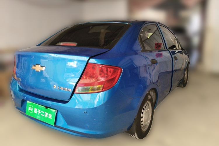 Used Chevrolet Sail 2013 Sedan 1.2L Manual Fashionable Happiness Edition Rear Right 45 Deg