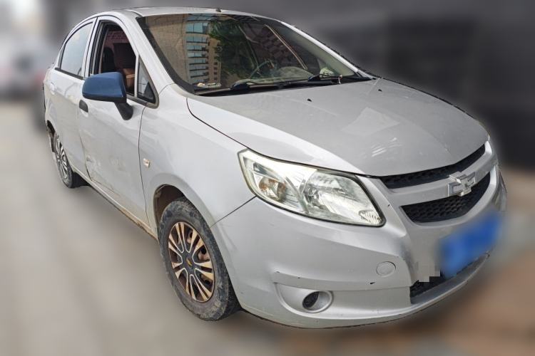 Used Chevrolet Sail 2013 Sedan 1.2L Manual Fashionable Happiness Edition Front Right 45 Deg