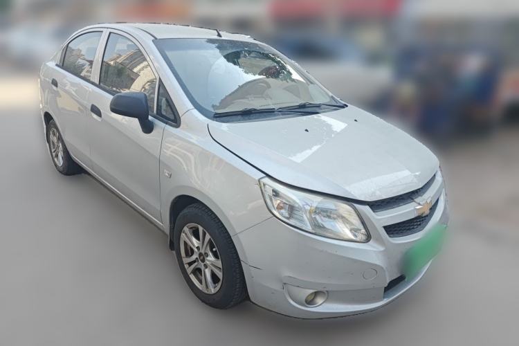 Used Chevrolet Sail 2013 Sedan 1.2L Manual Fashionable Happiness Edition Front Right 45 Deg