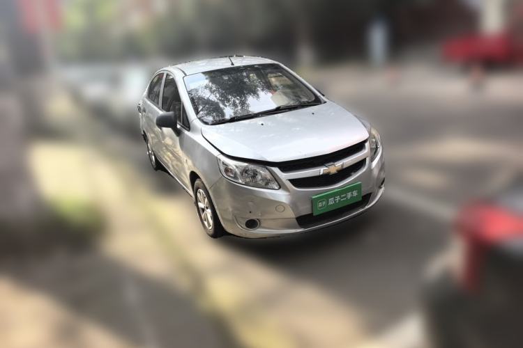 Used Chevrolet Sail 2013 Sedan 1.2L Manual Fashion Edition Front Right 45 Deg