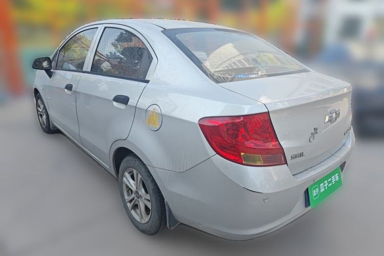 Used Chevrolet Sail 2013 Sedan 1.2L Manual Fashionable Happiness Edition Rear Left 45 Deg