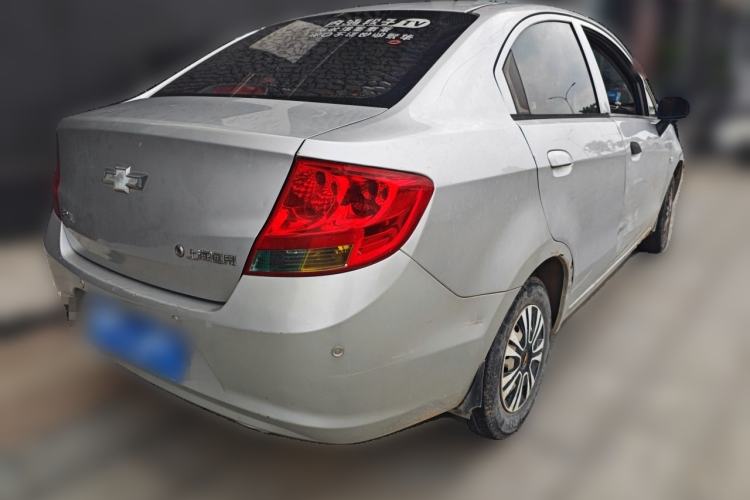 Used Chevrolet Sail 2013 Sedan 1.2L Manual Fashionable Happiness Edition Rear Right 45 Deg