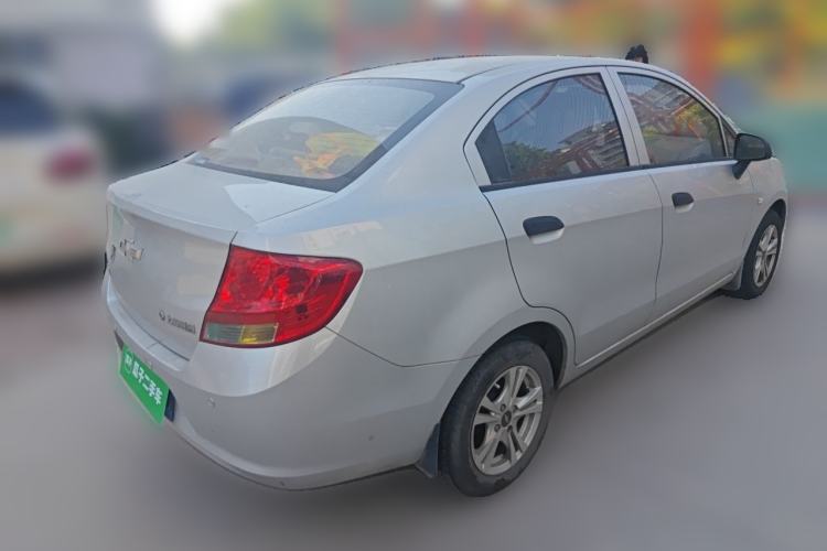 Used Chevrolet Sail 2013 Sedan 1.2L Manual Fashionable Happiness Edition Rear Right 45 Deg