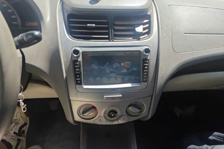 Used Chevrolet Sail 2013 Sedan 1.4L Manual Happiness Edition II Audio And AC Panel