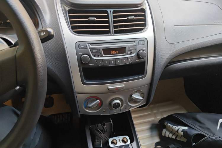 Used Chevrolet Sail 2013 Sedan 1.4L Manual Ideal Happiness Edition Audio And AC Panel