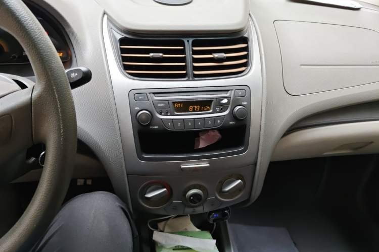 Used Chevrolet Sail 2013 Sedan 1.4L Manual Ideal Edition Audio And AC Panel